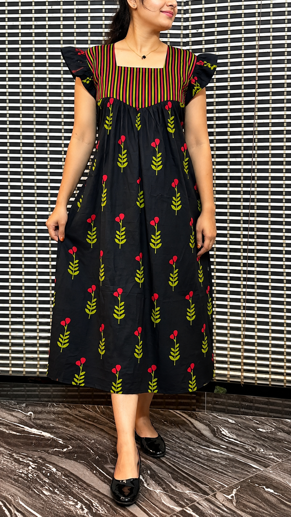 2026/10/122065.png Black blossom frock - Image 1